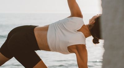 Close-up of a deep stretching yoga pose.
